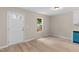 Modern eat-in kitchenette features stainless steel appliances, updated wood floors, and a street view at 810 Williams St, Burlington, NC 27217