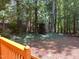 Wooded back yard view from the back deck at 8100 Laurel Mountain Rd, Raleigh, NC 27613