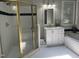 Bathroom featuring a shower, bathtub, white vanity, and natural light at 8100 Laurel Mountain Rd, Raleigh, NC 27613
