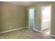 Bedroom featuring a neutral color palette at 8100 Laurel Mountain Rd, Raleigh, NC 27613
