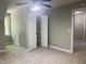 Bedroom featuring an open closet and neutral walls at 8100 Laurel Mountain Rd, Raleigh, NC 27613