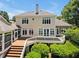 Expansive backyard featuring a deck, patio, and lush landscaping at 81002 Alexander, Chapel Hill, NC 27517