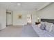 Bright bedroom featuring a ceiling fan, nightstands, and carpeted floors at 81002 Alexander, Chapel Hill, NC 27517