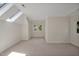 Bright, open bedroom with natural light from windows and skylight, and neutral carpet flooring at 81002 Alexander, Chapel Hill, NC 27517