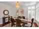 Bright dining room with decorative chandelier and large windows offering plenty of light at 81002 Alexander, Chapel Hill, NC 27517