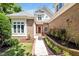 Charming brick home featuring a well-maintained front yard and inviting entrance at 81002 Alexander, Chapel Hill, NC 27517
