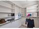 Spacious walk-in closet features built-in shelving and ample storage space at 81002 Alexander, Chapel Hill, NC 27517