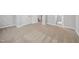 Spacious carpeted bedroom with neutral walls offering a tranquil and inviting atmosphere at 8422 Central Dr, Raleigh, NC 27613