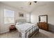Inviting main bedroom with a neutral color scheme and vaulted ceiling at 8885 Commons Townes Dr, Raleigh, NC 27616