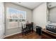 Bright breakfast nook with large windows, providing natural light, and seating for a cozy dining experience at 8885 Commons Townes Dr, Raleigh, NC 27616