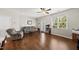 Cozy living room with ample seating and natural light at 8885 Commons Townes Dr, Raleigh, NC 27616