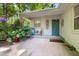 Charming front porch with teal door and colorful decor creating a welcoming entrance at 914 Cindy St, Cary, NC 27511