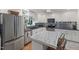 Updated kitchen featuring stainless steel appliances, and a modern backsplash and countertops at 914 Cindy St, Cary, NC 27511