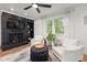 Charming living room with brick fireplace and built-in shelving offering ample space at 914 Cindy St, Cary, NC 27511