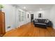 Bright living room with hardwood floors, neutral paint, and comfortable seating at 914 Cindy St, Cary, NC 27511