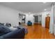 Spacious living room featuring gleaming hardwood floors and abundant natural light at 914 Cindy St, Cary, NC 27511