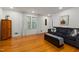 Cozy living room with hardwood floors, neutral paint, and comfortable seating at 914 Cindy St, Cary, NC 27511