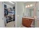 Bathroom with vanity and a walk-in closet at 997 Windy Rd, Apex, NC 27502