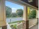 Spacious front porch offering scenic neighborhood views and a tranquil outdoor space at 997 Windy Rd, Apex, NC 27502