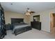 Spacious bedroom features a ceiling fan, carpeted floor, and a set of matching furniture at 101 Kingston Ln, Graham, NC 27253
