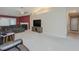 Cozy living room with a fireplace, a TV, and vaulted ceilings with lots of seating at 101 Kingston Ln, Graham, NC 27253