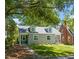 Charming grey home featuring a well-manicured lawn and dormer windows at 1022 Carolina Ave, Durham, NC 27705