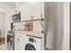 Modern kitchen with butcher block countertops, stainless steel appliances, and matte black hardware accents at 1022 Carolina Ave, Durham, NC 27705