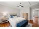 Bedroom with a comfortable bed, neutral colors, and a ceiling fan for added comfort at 1022 Carolina Ave, Durham, NC 27705