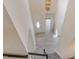 Expansive foyer with high ceilings, a statement chandelier, and light wood-look flooring for a bright and welcoming entrance at 103 Equestrian Ct, Cary, NC 27513