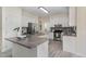 The modern kitchen boasts granite countertops, stainless steel appliances, and lots of cabinet space at 103 Equestrian Ct, Cary, NC 27513