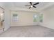This is an unfurnished room with carpet and three windows that provide natural light at 103 Equestrian Ct, Cary, NC 27513