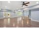 Expansive finished basement with exposed concrete floors, recessed lighting and access to the backyard at 107 Sonoma Valley Dr, Cary, NC 27518