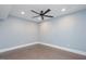 Bedroom with neutral walls, ceiling fan, recessed lights, and stained concrete floors at 107 Sonoma Valley Dr, Cary, NC 27518