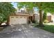 Beautiful brick home featuring an attached two-car garage and a well-maintained concrete driveway at 107 Sonoma Valley Dr, Cary, NC 27518