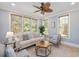 Comfortable living room featuring natural light from multiple windows at 107 Sonoma Valley Dr, Cary, NC 27518