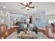 Bright living room with hardwood floors and a ceiling fan at 107 Sonoma Valley Dr, Cary, NC 27518