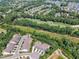 Overhead view featuring the neighborhood golf course, offering leisure and recreation right near home at 108 Ribbon Walk Ln, Holly Springs, NC 27540