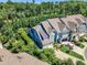 Beautiful aerial view of a home featuring well-maintained landscaping and a private driveway with ample parking at 108 Ribbon Walk Ln, Holly Springs, NC 27540