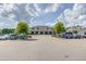 Spacious 12 Oaks Clubhouse surrounded by well-maintained landscaping, ample parking, and community charm at 108 Ribbon Walk Ln, Holly Springs, NC 27540