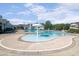 Community pool area with shallow entry area and a splash umbrella for the  at 108 Ribbon Walk Ln, Holly Springs, NC 27540