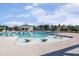 Spacious pool with a shallow water area featuring lounge chairs and lap lanes at 108 Ribbon Walk Ln, Holly Springs, NC 27540