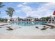Outdoor pool and lounge area with in-pool loungers and plenty of seating at 108 Ribbon Walk Ln, Holly Springs, NC 27540