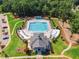 Aerial view of the community swimming pool with zero entry and lap lanes at 108 Ribbon Walk Ln, Holly Springs, NC 27540