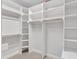 Spacious walk-in closet with custom shelving and storage provides ample space at 108 Ribbon Walk Ln, Holly Springs, NC 27540