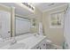 Bright bathroom featuring double sinks, large mirror, and neutral color palette, perfect for a refreshing start to your day at 112 Barcelona Ct, Cary, NC 27513