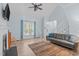 Cozy living room featuring a fireplace, ample natural light, and an airy atmosphere at 112 Barcelona Ct, Cary, NC 27513