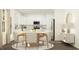Bright, open kitchen and dining area with white cabinets and modern appliances at 144 Digging Time Ave, Princeton, NC 27569