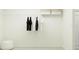 Spacious walk-in closet featuring wire shelving, an ottoman, and hanging rods at 144 Digging Time Ave, Princeton, NC 27569