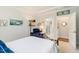 Cozy bedroom featuring carpet flooring and access to an ensuite bathroom at 149 Ivory Ln, Raleigh, NC 27610
