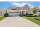 Beautiful one-story home with a two-car garage and well-manicured front lawn at 149 Ivory Ln, Raleigh, NC 27610